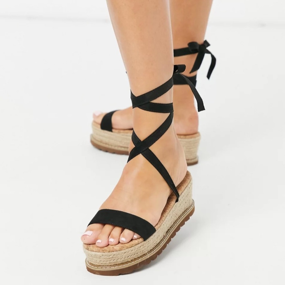 Platform wedge sandal ties up on legs